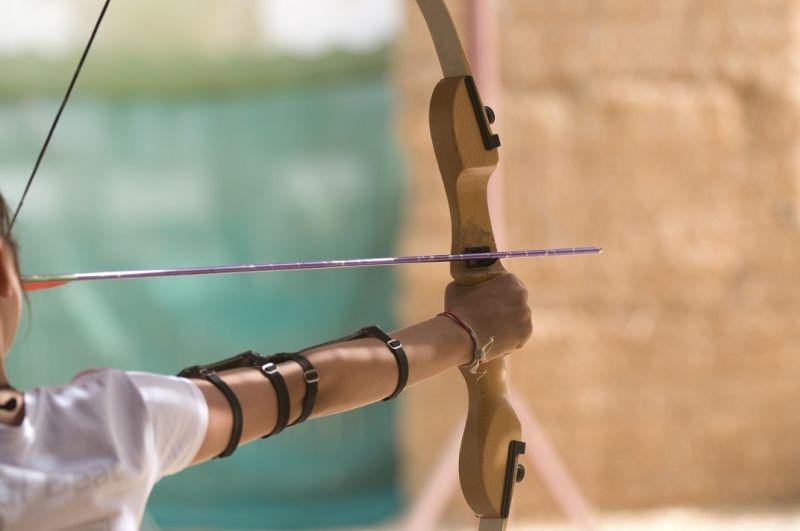 Archer lines up arrow